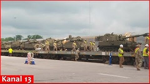 Armored vehicles unload from trains for upcoming military parade in Washington