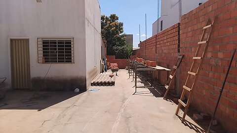 The garage tiles have been removed now and the wall is going up to put the wood in.