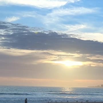 Sun Glowing Up The Clouds