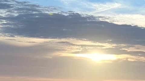Sun Glowing Up The Clouds