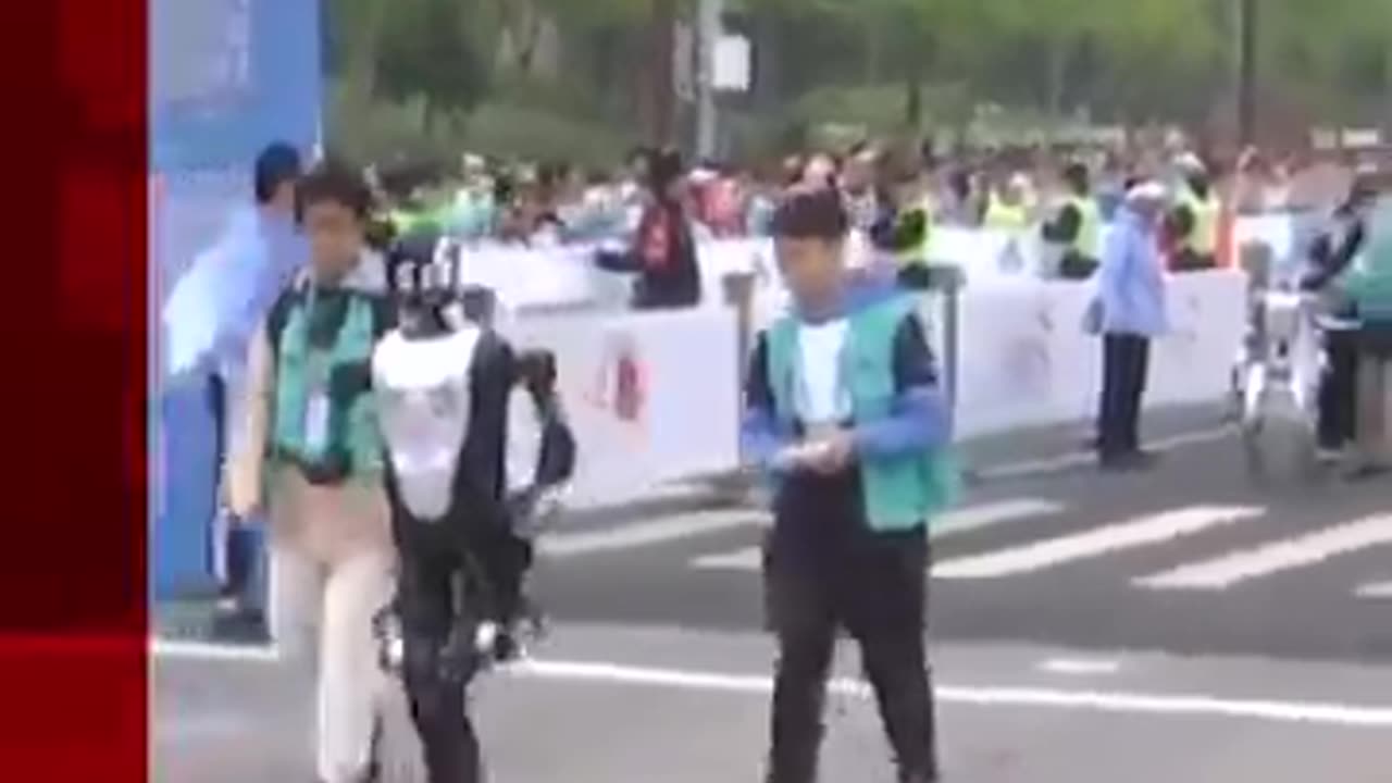 China races humans against robots in Beijing half marathon.