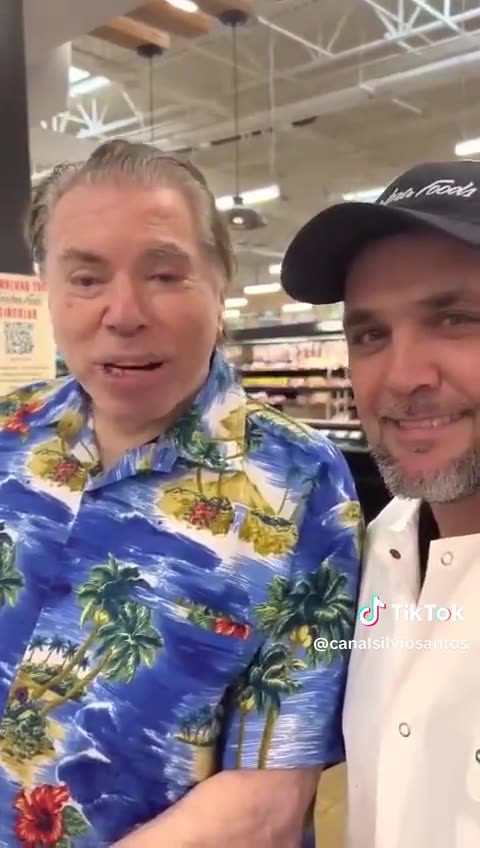 Silvio Santos sendo simpático com fã nos EUA