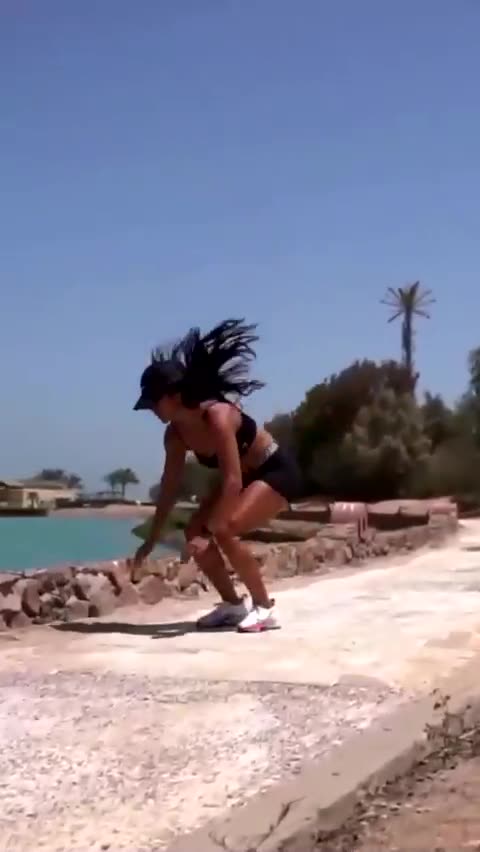 The girl trains abs and cardio