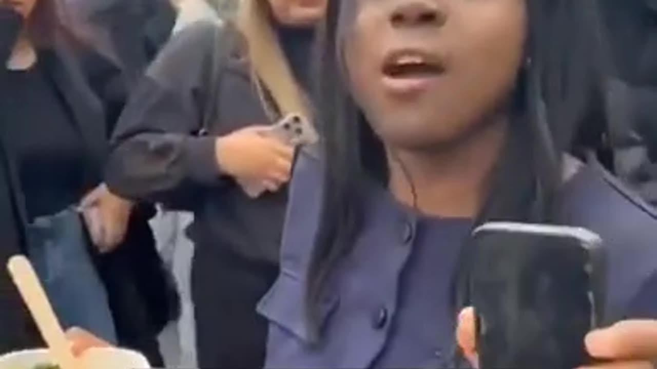 An Angry Shaniqua throws food at a white womans head because she was white