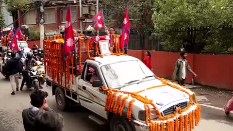 Nepalis weep at funerals for those killed in anti-graft protests
