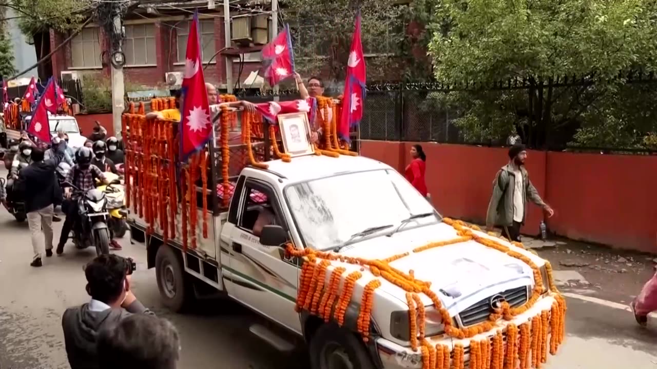 Nepalis weep at funerals for those killed in anti-graft protests