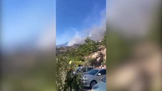 Video shows massive smoke plume from wildfires on Greece's Crete