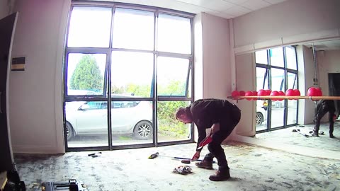 Preparing subfloor for laminate flooring, commercial job