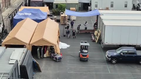 Movers clearing out the studio of "Jimmy Kimmel Live" as CNN reports ABC will bring him back if he