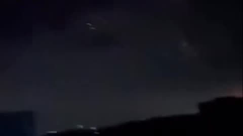 Footage captures Iranian missile rain down and strike targets in Israeli-occupied territories