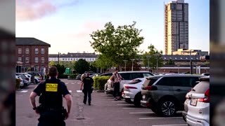 Climber scales, leaps off Denmark hotel in base jump stunt