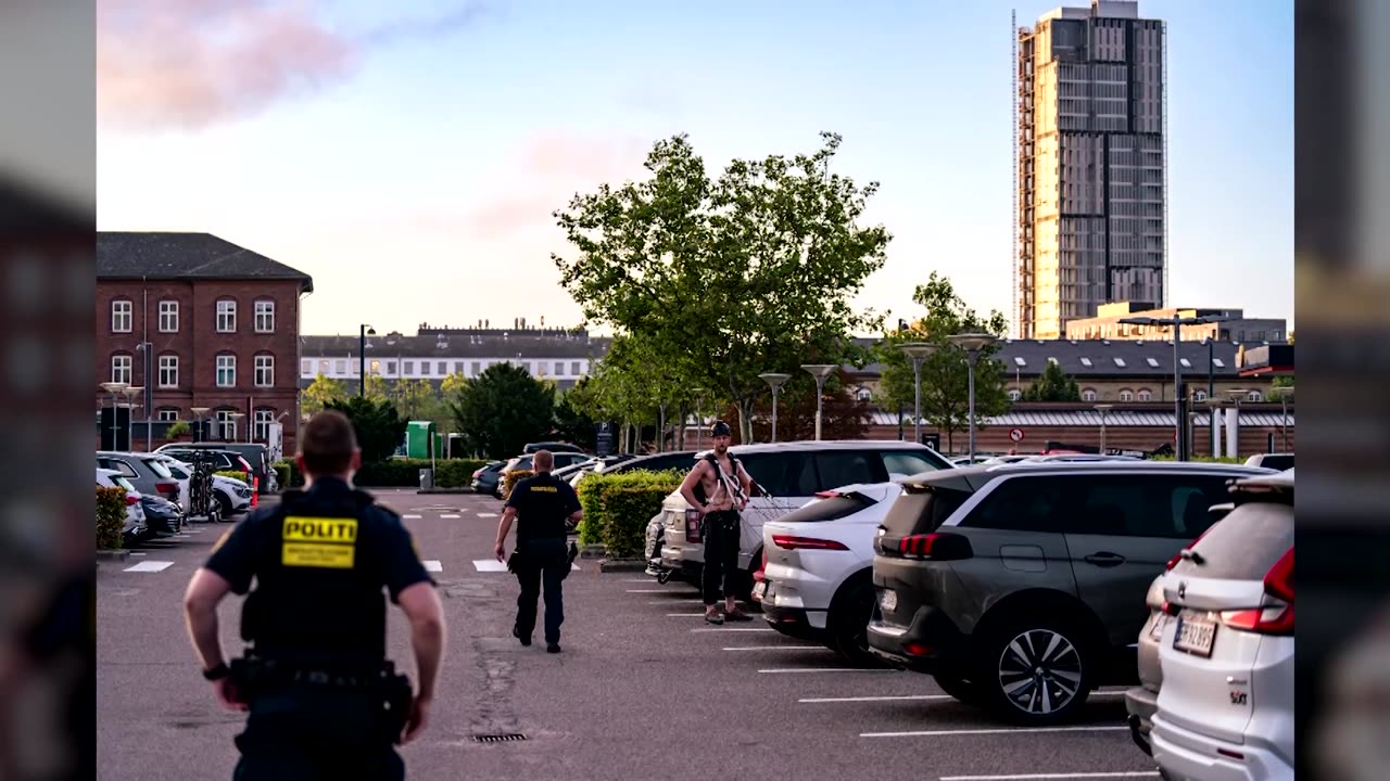 Climber scales, leaps off Denmark hotel in base jump stunt