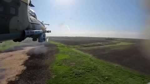 Ukrainian Mi24 Attack Helicopters Firing Rockets into Russian Lines