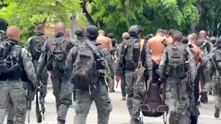 Rio police raids kill 60 ahead of climate conferences, source says