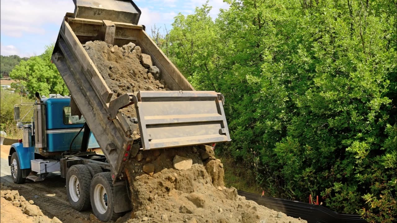 Bulldozer Dumpster