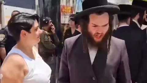 Jew caught on video freaking out just because a Christian woman stood near him