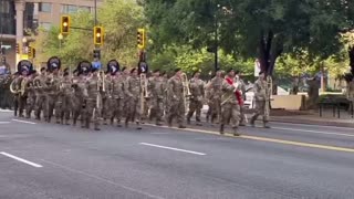 Troops march on the streets of Washington, D.C., preparing for the Army's 250th anniversary parade tomorrow.