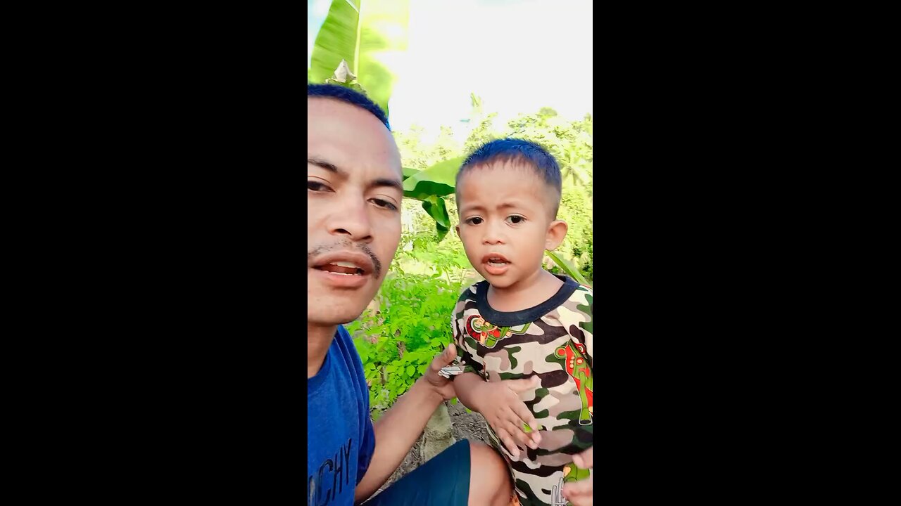 Making content with my child in the garden, guys.