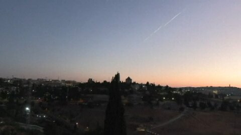 Smoke trails streak over Jerusalem as Iran fires more missiles