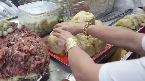 Surprisingly, customers spent hours waiting to eat the unusually shaped pateso.