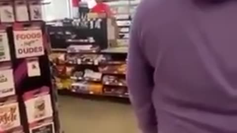 A fatigued white cashier breaks it down to a violent black customer
