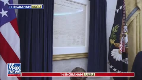 President Trump shows off display of Declaration of Independence hanging in Oval Office