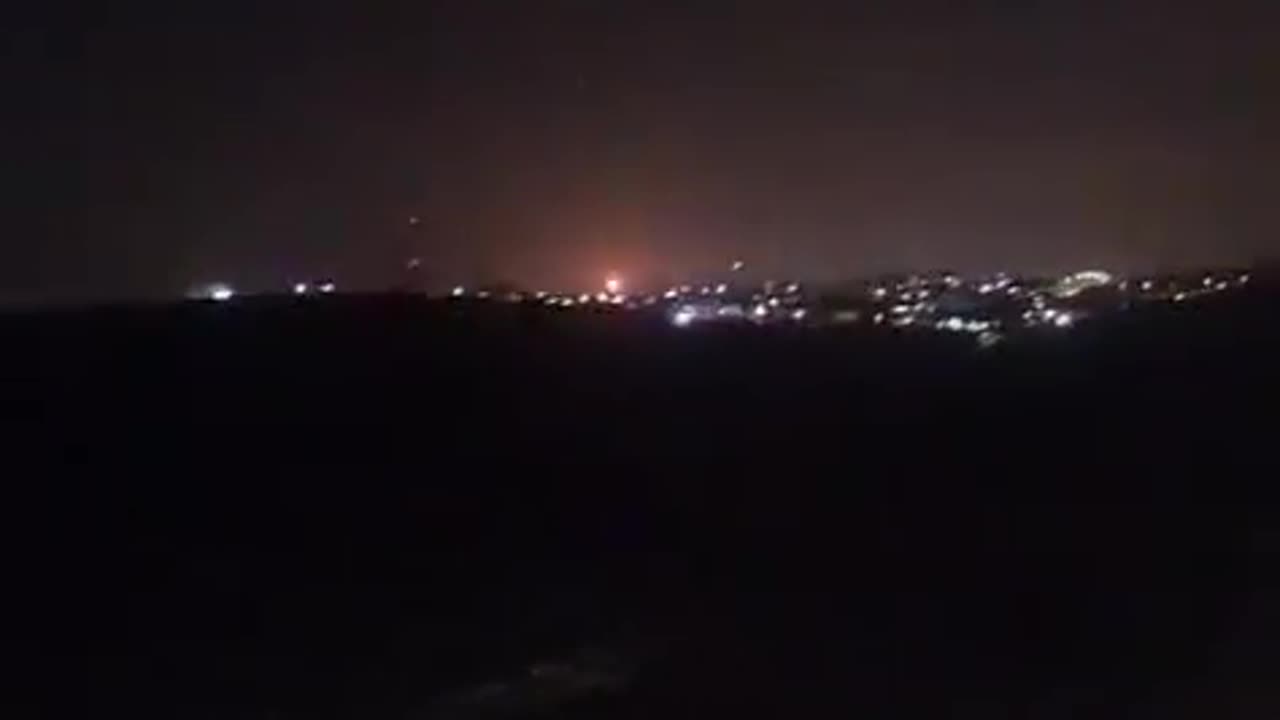 A missile looks like it has fallen in the distance.