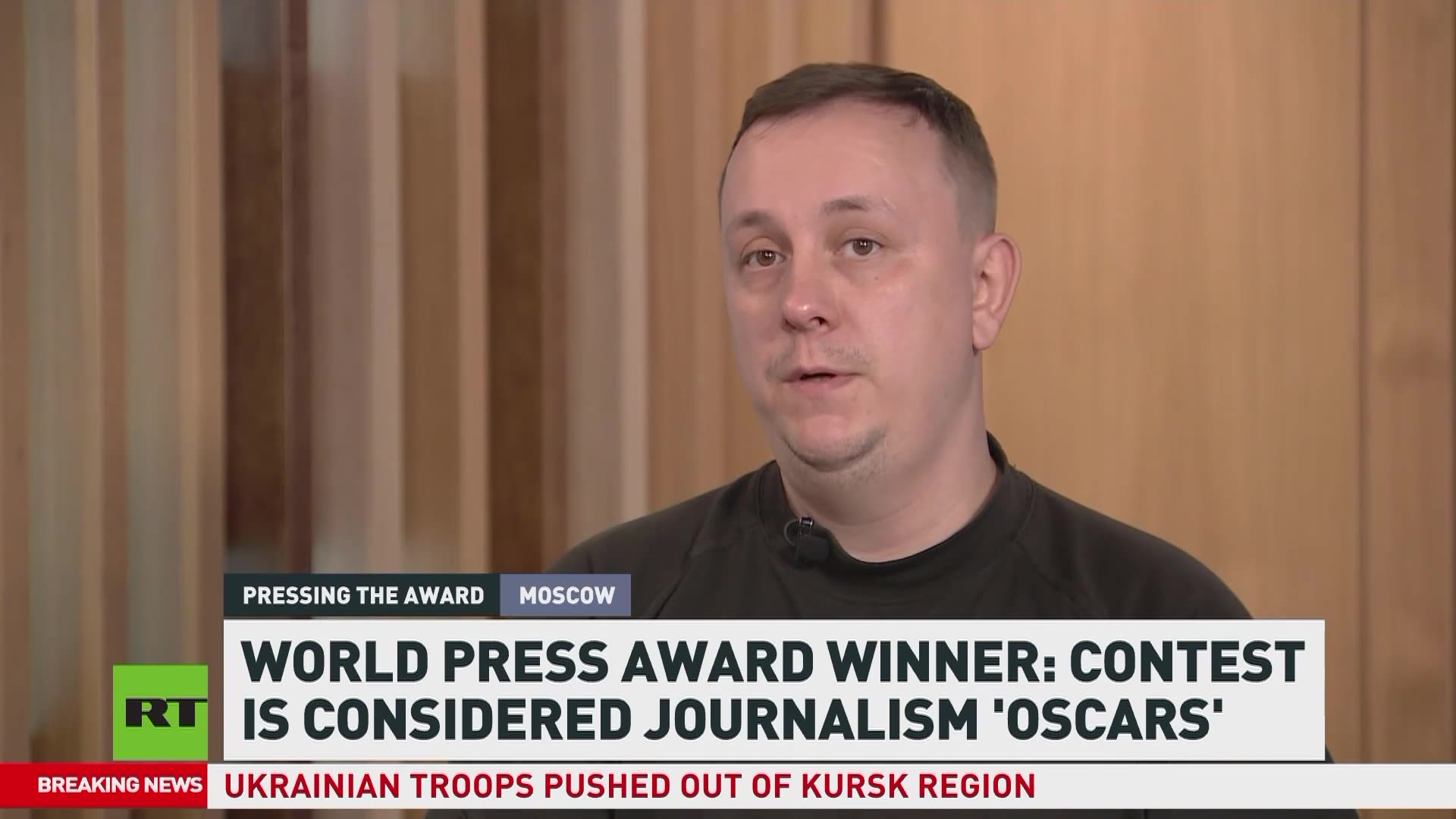 Russian photojournalist wins World Press honor, is excluded from awards ceremony