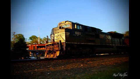 NS 1020 and BNSF Going Over Railroad Bridge - St. Croix Subdivision