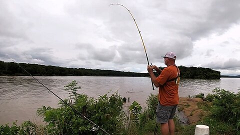 Bobber fishing for catfish in shallow water