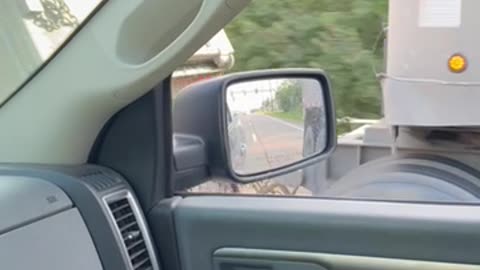 Here is the sound of an empty gravel hauler truck along Dixie Highway