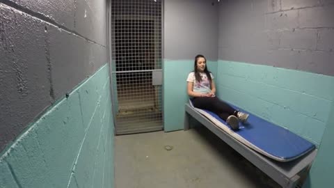 Woman shackled in cell