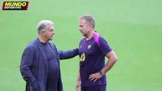 What might Joan Laporta and Hansi Flick be saying to each other?