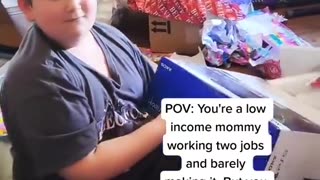Mom's Christmas gift makes young boy so happy.