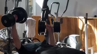 Artur Beterbiev Presses 103lb Dumbbells in Each Hand