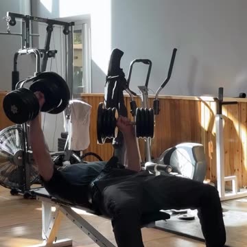 Artur Beterbiev Presses 103lb Dumbbells in Each Hand