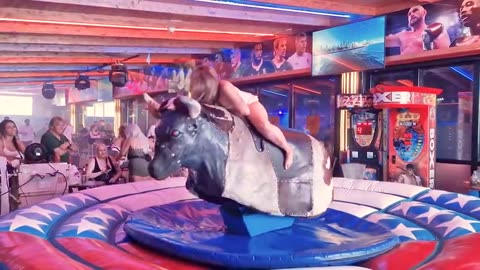 girl and macenikal bull