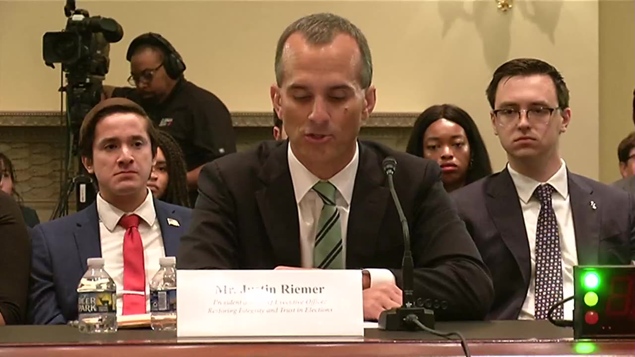 Mr. Justin Riemer delivers opening remarks at voter list maintenance hearing