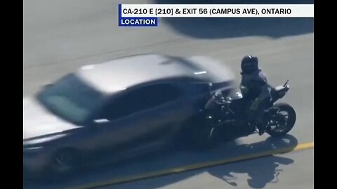 high-speed police motorcycle pursuit ends w/ car deliberately rams into the suspect’s bike