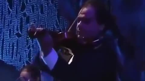 Robert Plant and Jimmy Page performing "Kashmir" with the Egyptian orchestra
