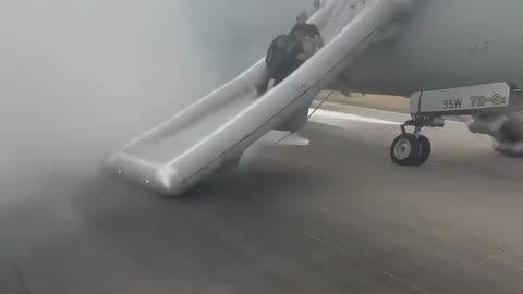 People in Denver Evacuate From an American Airlines Jet After Wheels Caught Fire