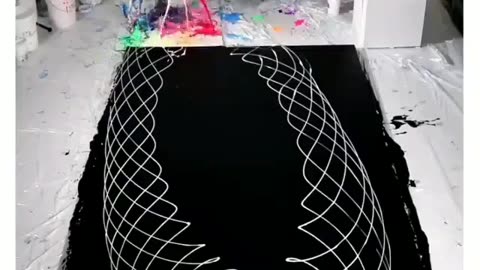 The mesmerizing creation of a painting Using the pendulum effect.