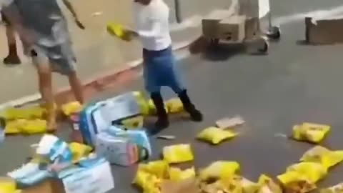 Jew children stomping on the aid for Gaza