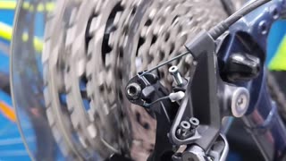 How does the Shimano Deore 12s rear derailleur work