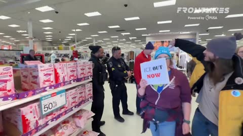 Leftists march through target in staged sit in
