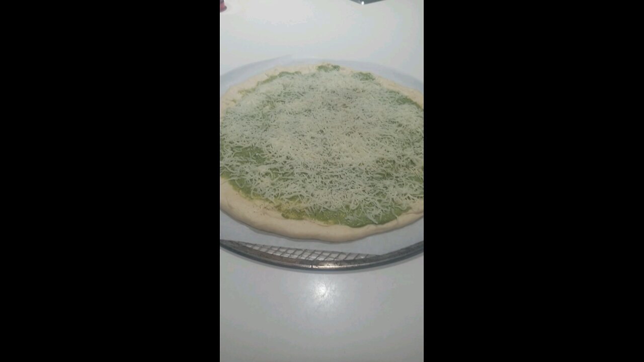 Pretty over done pesto pizza...