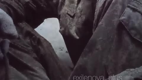 Russian Soldier Climbs Inside of a Well, Trying to Scrape Out Last Bit of Water
