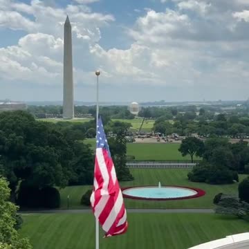 What a beautiful view from the White House roof of the new flag being raised!