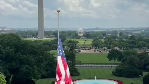 What a beautiful view from the White House roof of the new flag being raised!