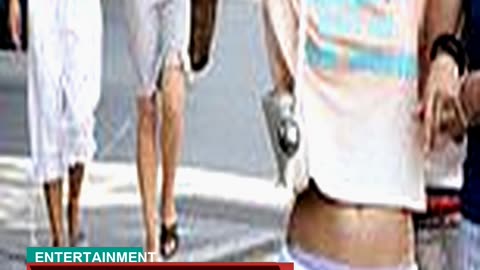 Iris Law Flashes a Glimpse of Her Toned Midriff in